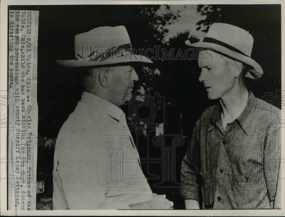 1947 Charles Peterson father of missing Child discuss with Sheriff - Historic Images