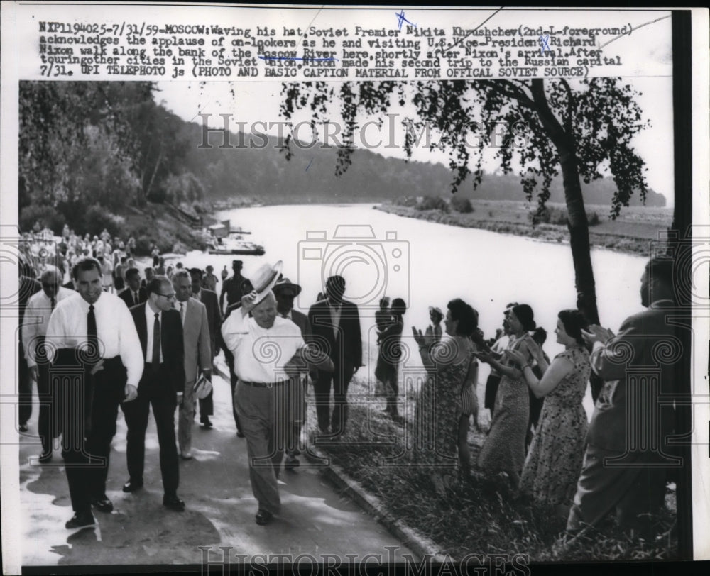 1959 Soviet Premier Khrushchev waves hat as he walks with Nixon-Historic Images