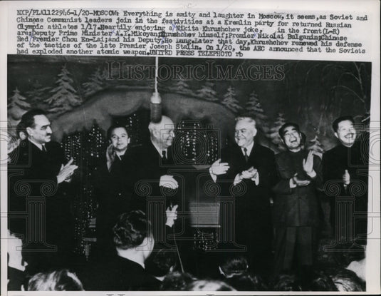1957 Russian & Chinese officials celebrate return of Olympic athlete-Historic Images