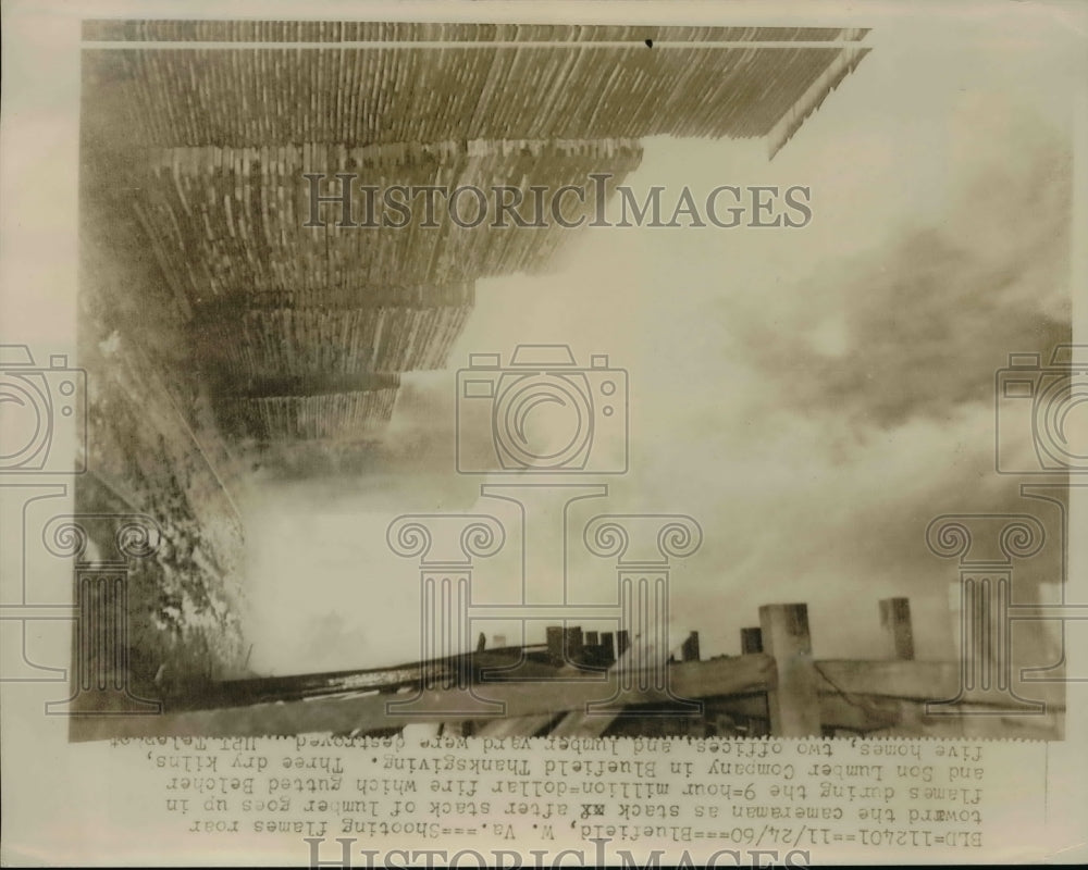 1960 Press Photo Lumber burns at Belcher & Sons Lumber Company in Bluefield WV - Historic Images