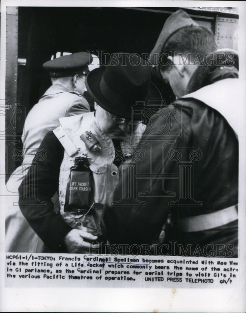 1955 Press Photo Cardinal Francis Spellman in Mae West Life Jacket to Visit GIs - Historic Images