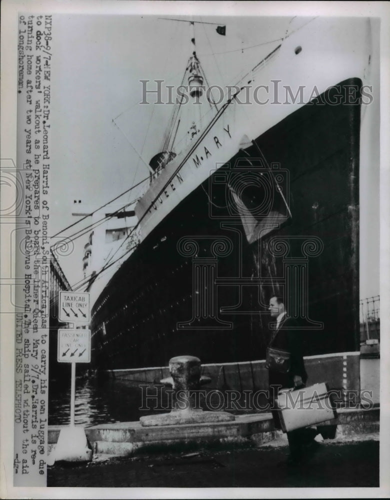 1955 Dr Leonard Harris Has to Carry His Own Luggage Due to Walkouts - Historic Images