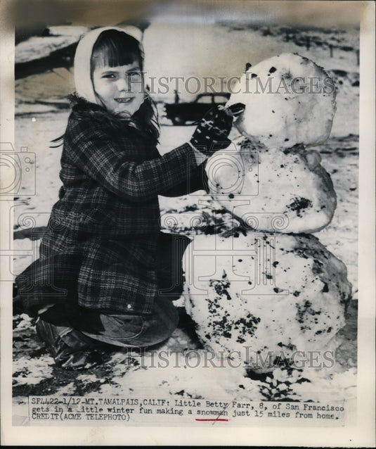 1950 Press Photo Betty Farr of San Francisco, California Builds Snowman-Historic Images