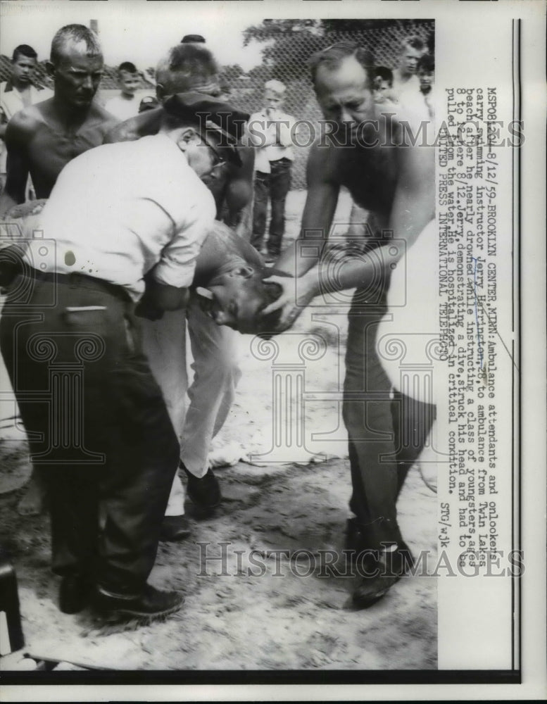 1959 Press Photo Injured Swimming Instructor Jerry Harrington, Minnesota - Historic Images