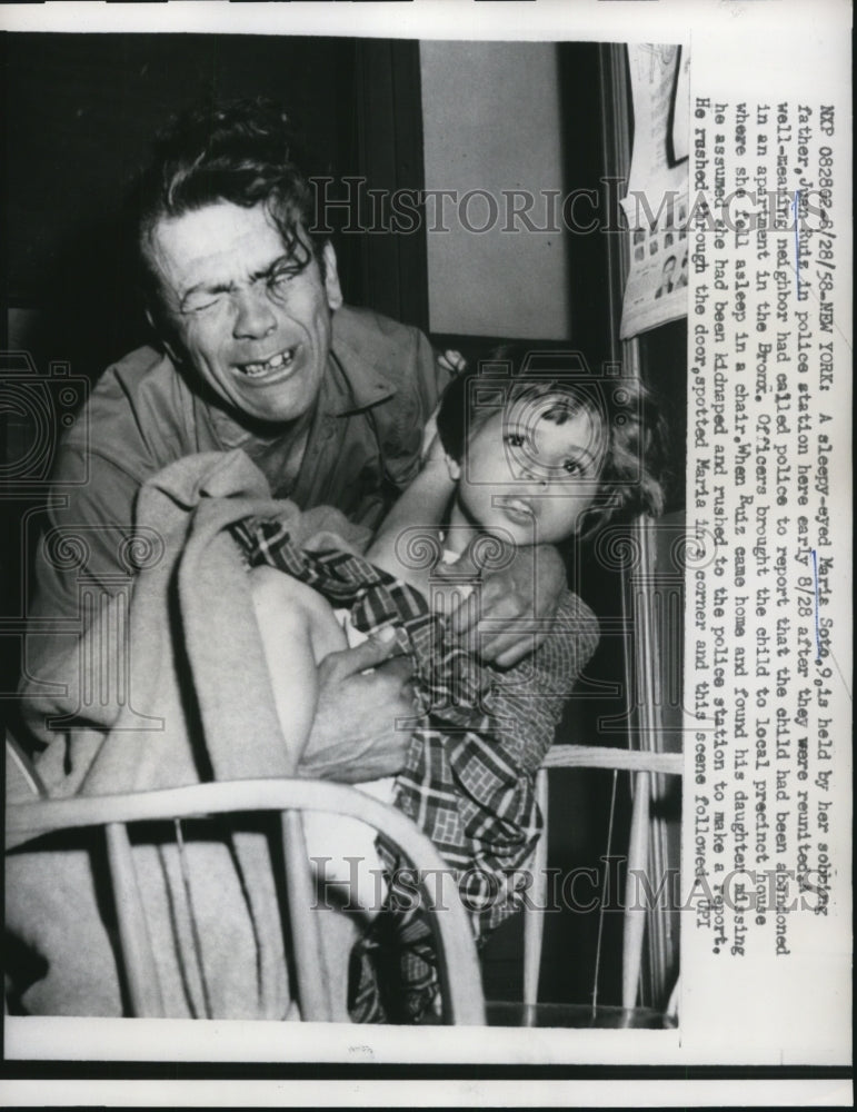 1958 Press Photo Maria Soto held by father Juan Ruiz after they were reunited - Historic Images