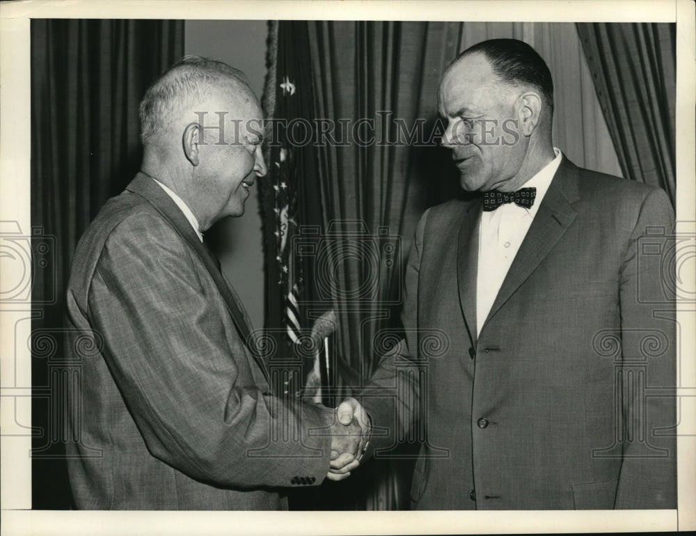 1957 Press Photo President Dwight Eisenhower Shakes Hands with Official-Historic Images