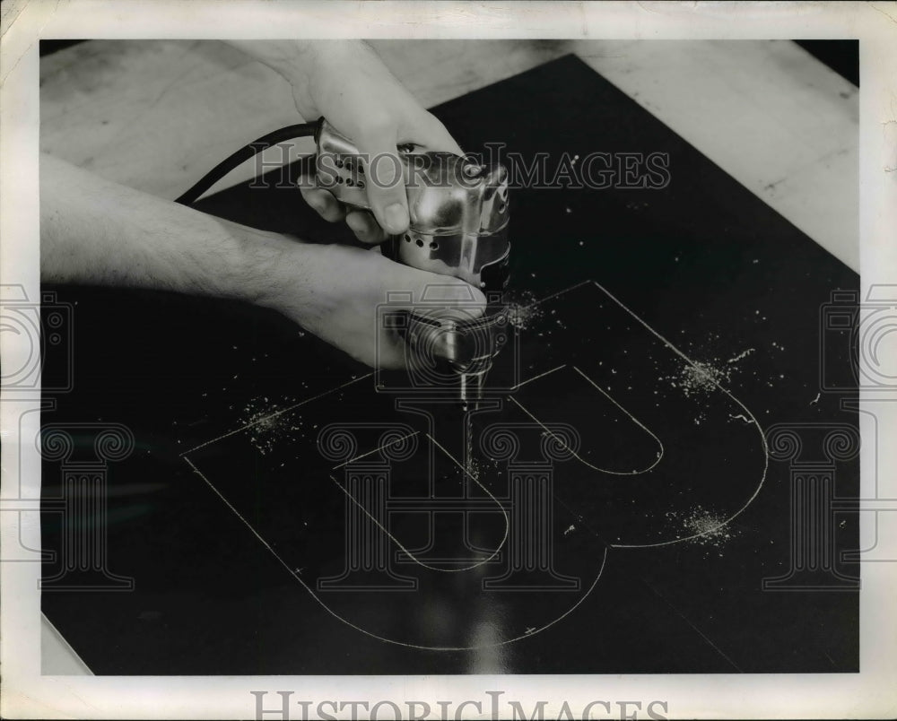 1951 Press Photo Drill 1/8th-Inch Holes for the Rivets Which Will Hold Clips - Historic Images