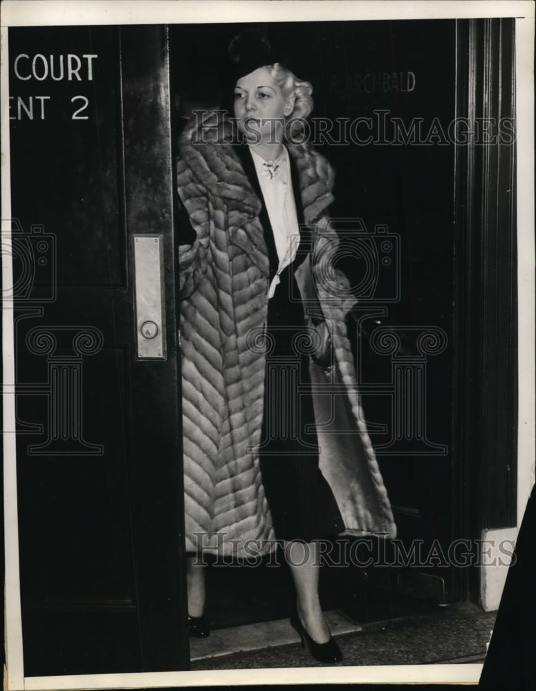 1937 Lucille McBride Leaves Courtroom After Testifying About Husband - Historic Images