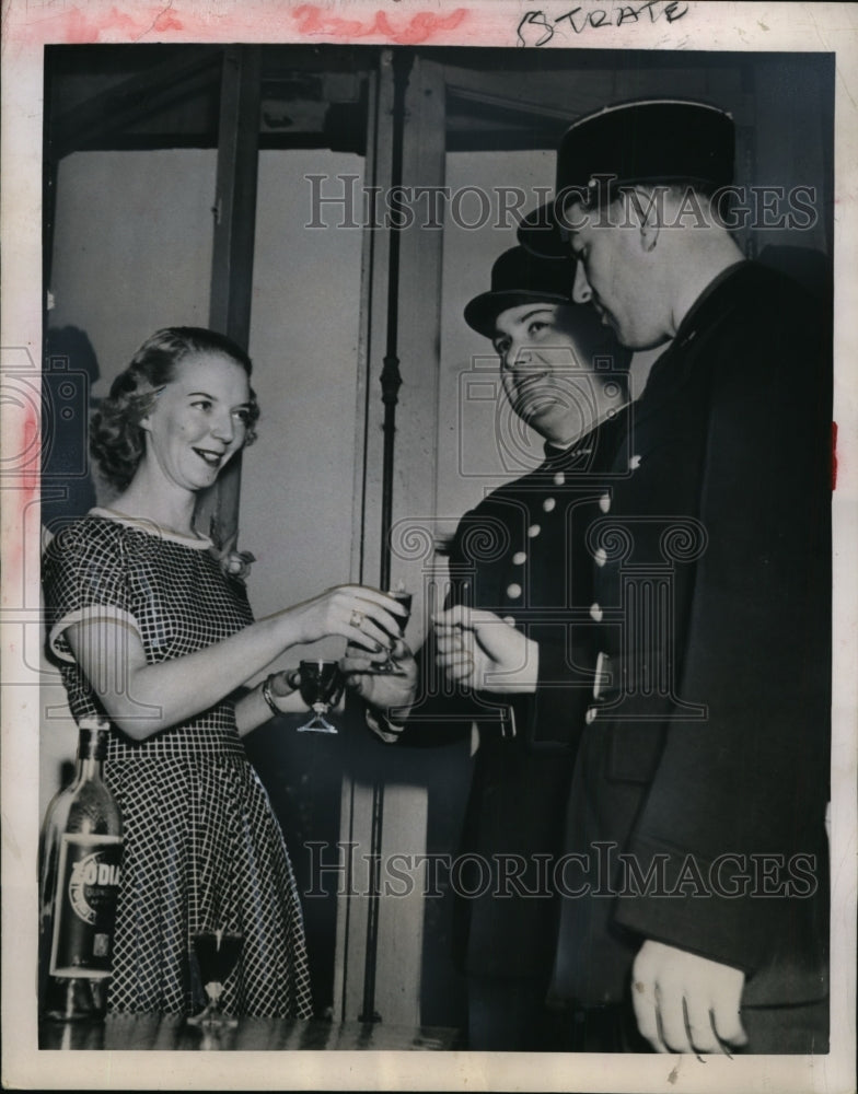 1949 Claude Marie, daughter to Andre Marie passing out cold drinks - Historic Images