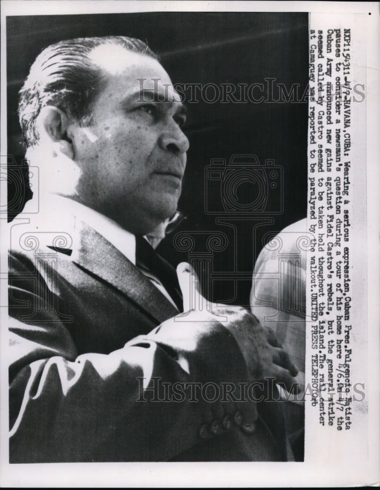 1958 Press Photo Fulgencio Batista Pauses to Consider Newsman&#39;s Question - Historic Images