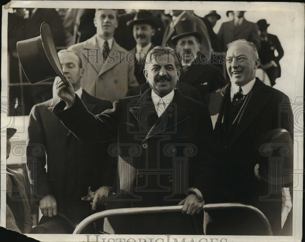 1931 Premier Pierre Laval of France waving his hat board  - Historic Images