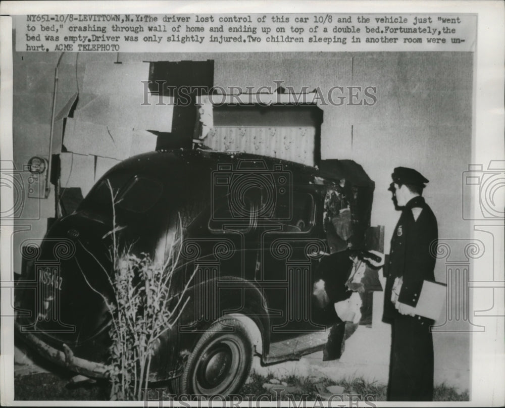 1950 Driver loses control of car and crashes through wall of home - Historic Images