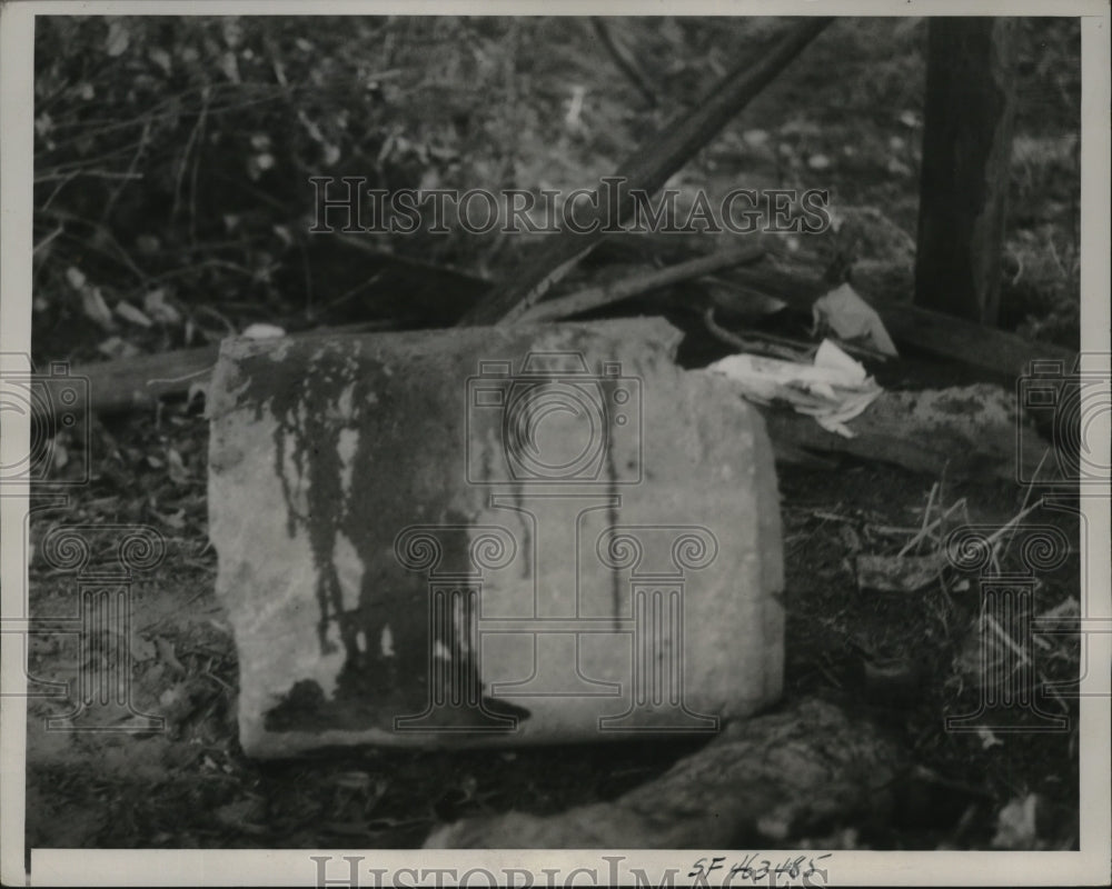 1938 Ola Irene Harwell uses concrete pipe as a chopping block - Historic Images