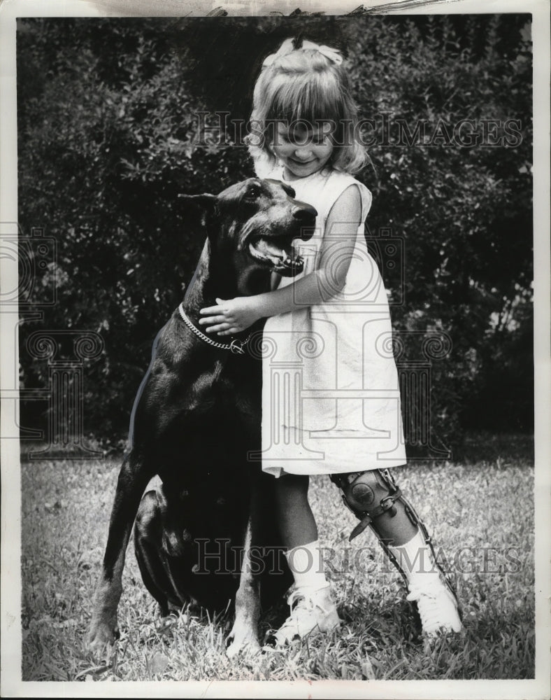 1963 Kim Schuessler with her Doberman Pinscher Missy  - Historic Images