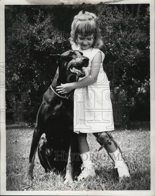 1963 Kim Schuessler with her Doberman Pinscher Missy  - Historic Images