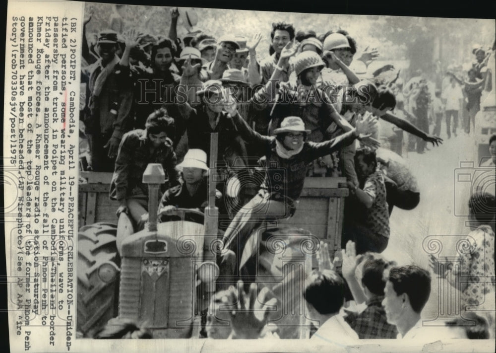 1975 Press Photo Unidentified People Wave to Passerby From Truck in Poipet-Historic Images