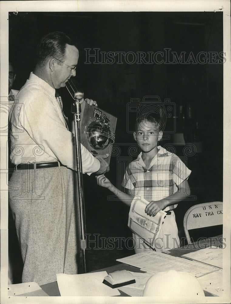 Undated Young Boy received at trophy  - Historic Images