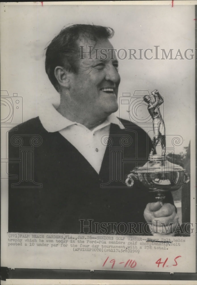 1969 Tommy Bolt Holds Trophy from Winning Ford - Historic Images