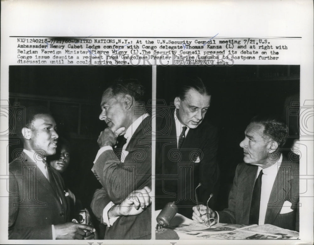 1960 Henry Cabot Lodge confers with Congo delegate Thomas Kanza - Historic Images