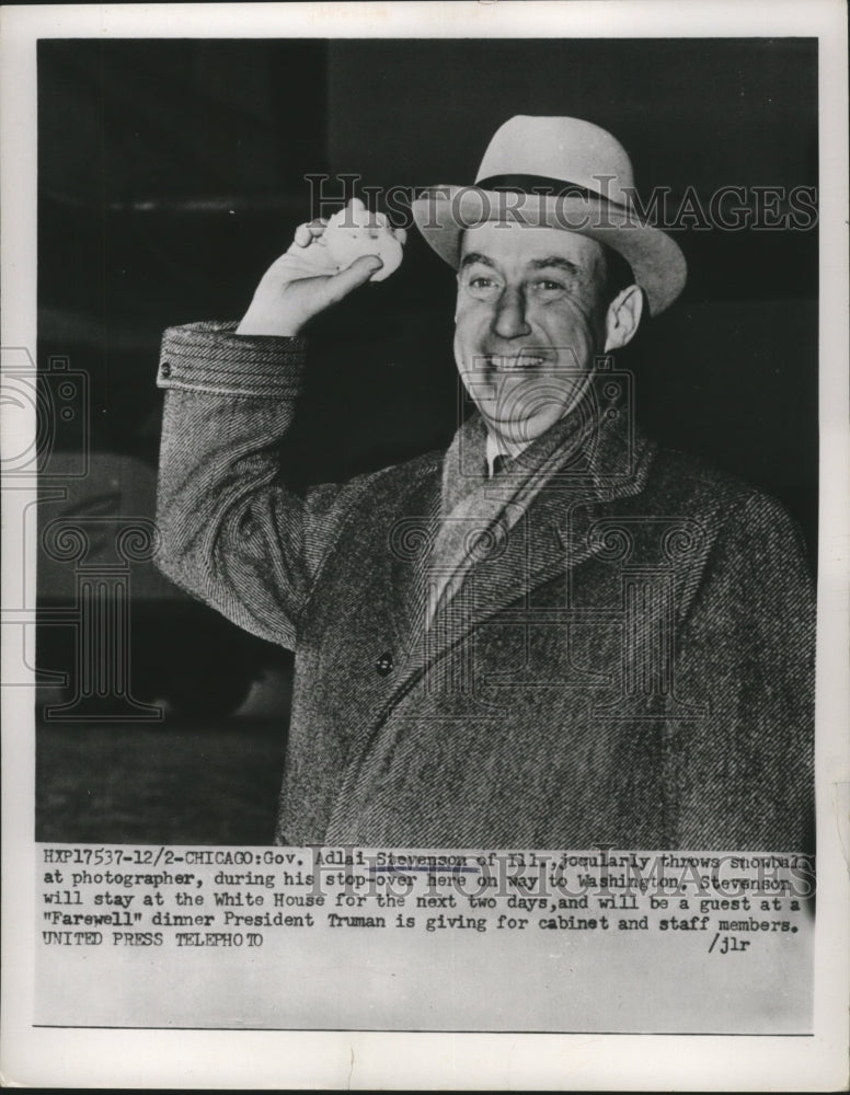 1952 Press Photo Gov. Adlai Stevenson of Ill. throws snowball at Photographer-Historic Images