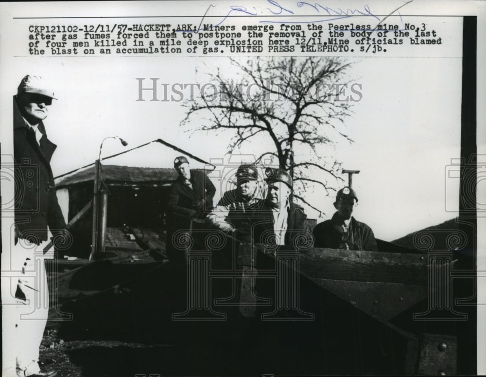 1957 Miners emerge from the Peerless Mine No.3 after gas fumes - Historic Images