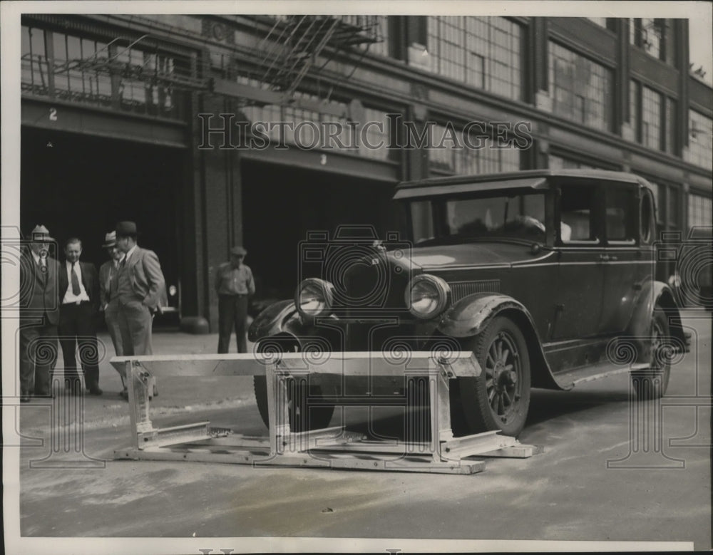 1936 Press Photo Car barrier placed to protect street workers - nef62770-Historic Images