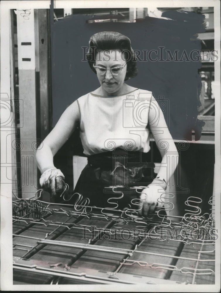 1967 Helen (Mrs. Frank) Kovacevic assembling bed springs  - Historic Images