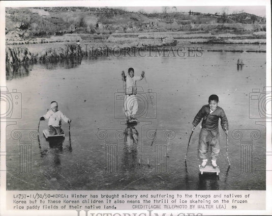 1950 Press Photo Children Like the Thrill of Ice Skating on Frozen Rice Fields-Historic Images