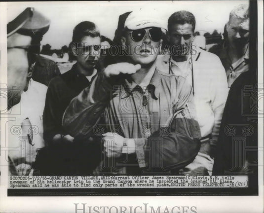 1956 Officer James Spearman Tells Newsmen of Helicopter Trip - Historic Images