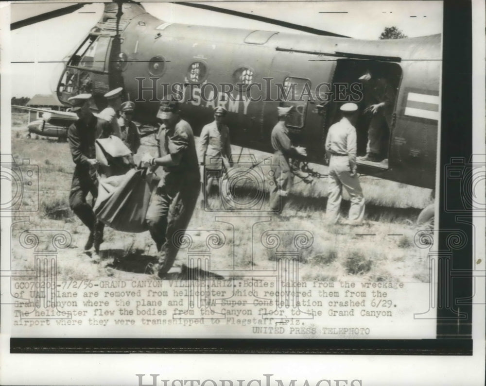 1956 Bodies Taken From Wreckage of the UNL Plane are Removed - Historic Images