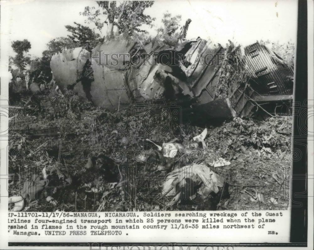 1956 Press Photo Soldiers Search Wreckage of Guest Airlines 4-Engine Plane-Historic Images