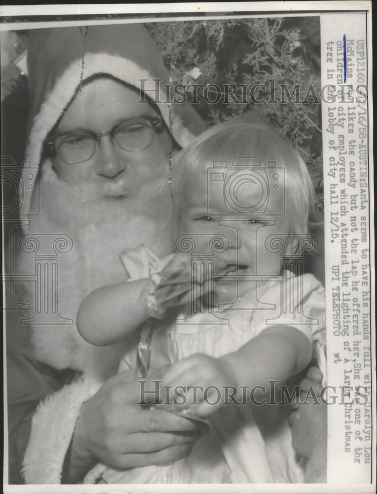 1958 Santa Seems to Have His Hands Full with Carolyn Lou McMaine - Historic Images