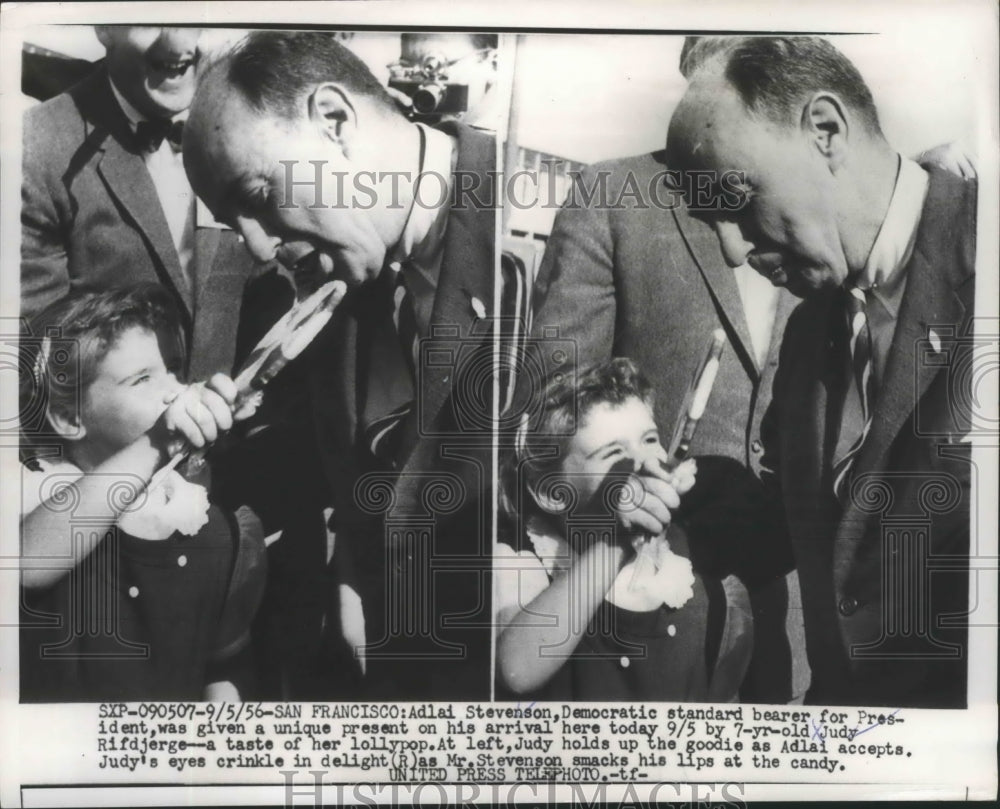 1956 Press Photo Adlai Stevenson Given Present on Arrival From Judy Rifdjerge - Historic Images