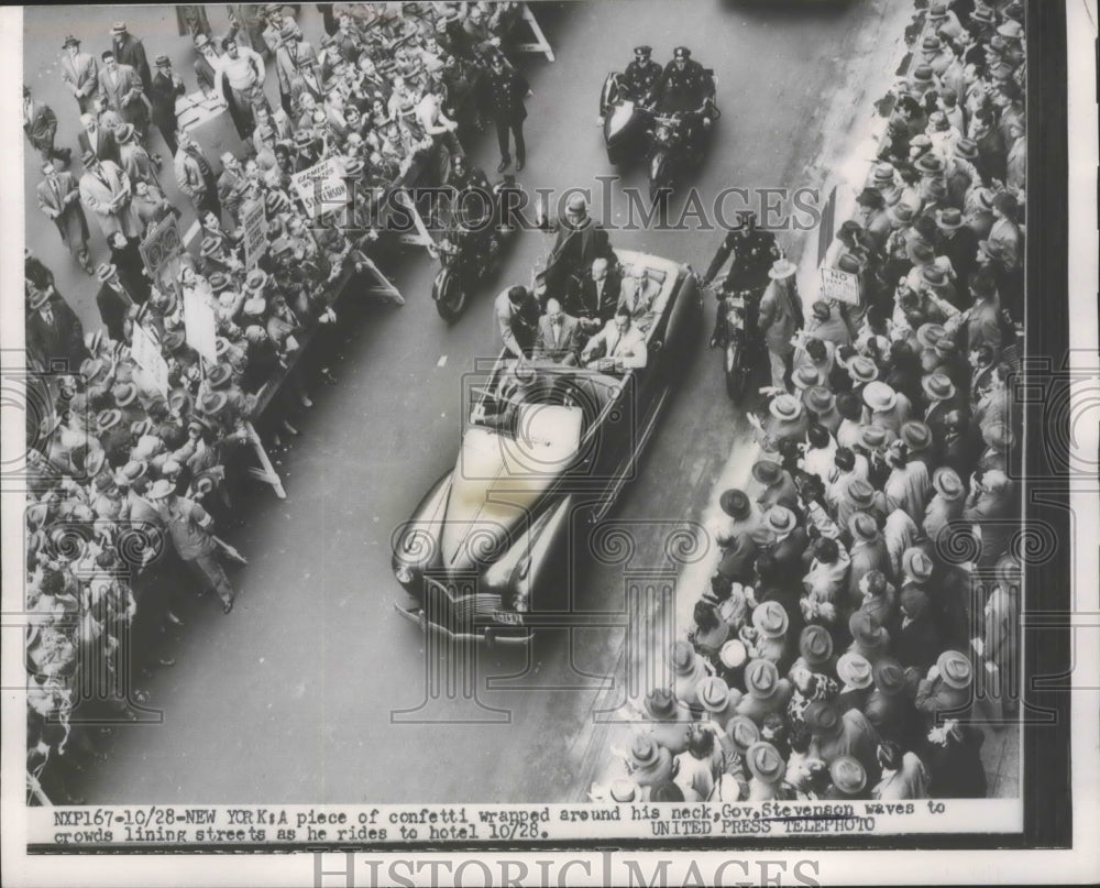 1952 Confetti Wrapped Around Gov Stevenson's Neck as He Waves - Historic Images