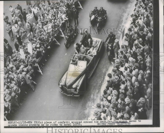 1952 Confetti Wrapped Around Gov Stevenson's Neck as He Waves - Historic Images