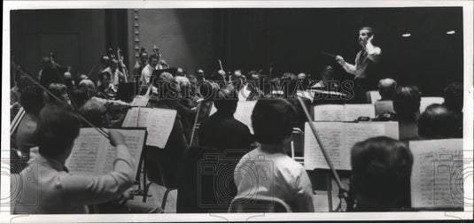1970 Press Photo Conductor Leading People Playing Instruments - nef66108-Historic Images
