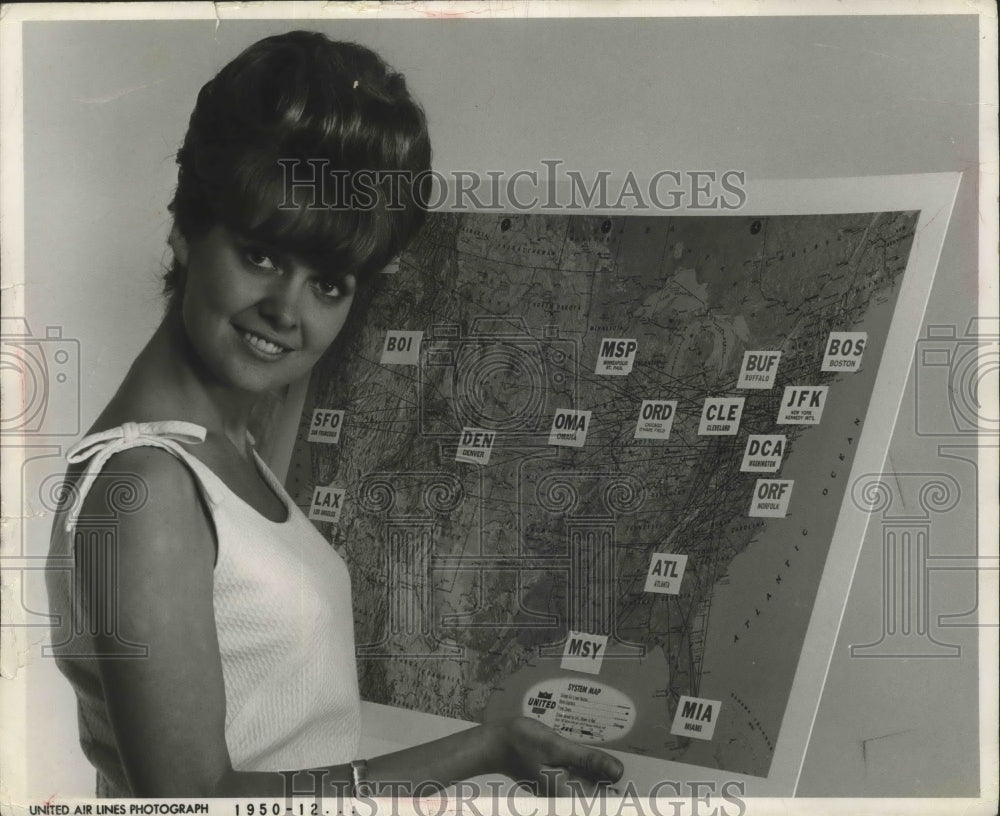 1966 Press Photo Karen Van Ort of United Air Lines&#39; Displays Map of Routes- Historic Images