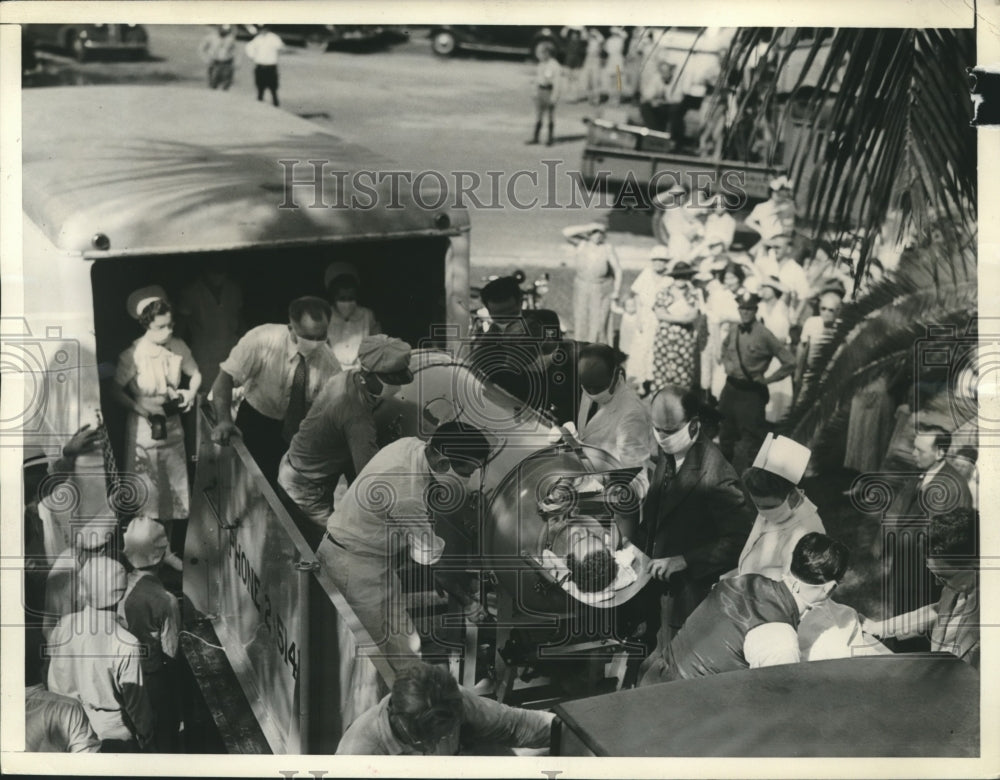 1937 Press Photo Fred B. Snite, Jr Travels 11,500 Mi. to Florida in Iron Lung-Historic Images