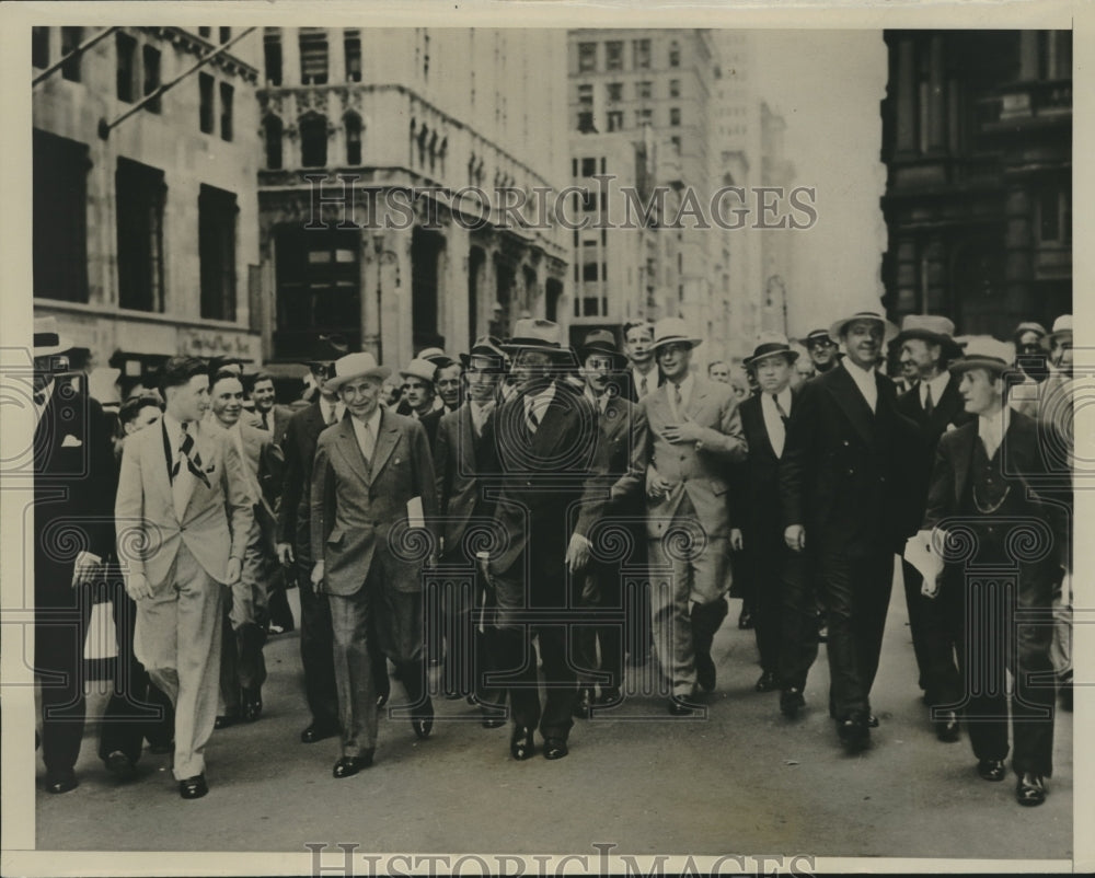 1933 Charles Mitchell acquitted from tax evasion seen with crowd - Historic Images