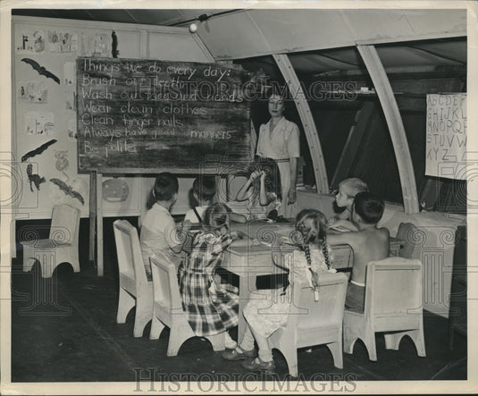 1946 Louise Garrison and her students in "Little Red School House" - Historic Images