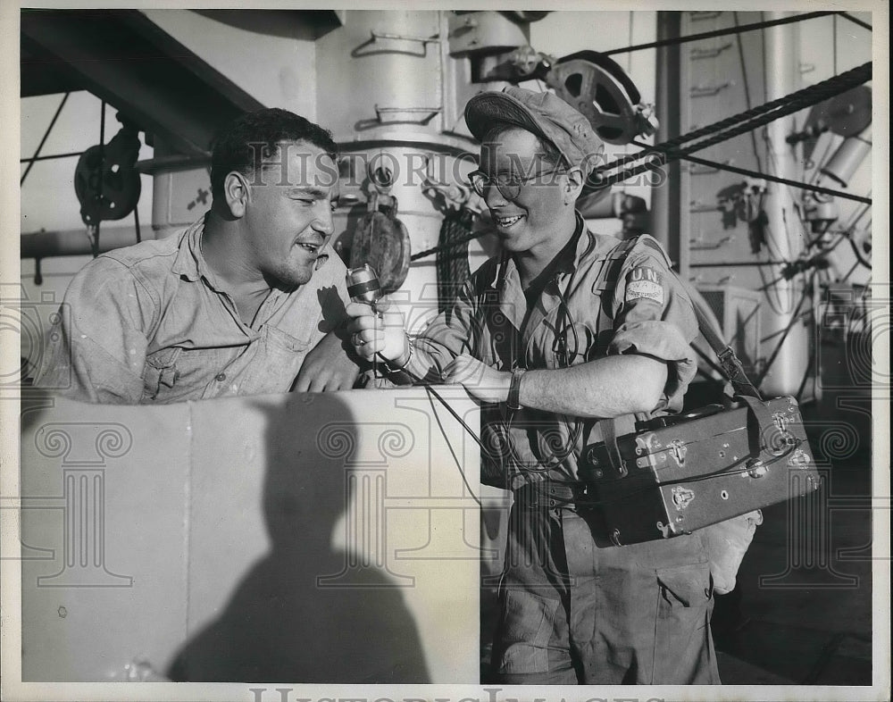 1950 Press Photo CBS Journalist George Herman interview crew of U.S. Ship. - Historic Images