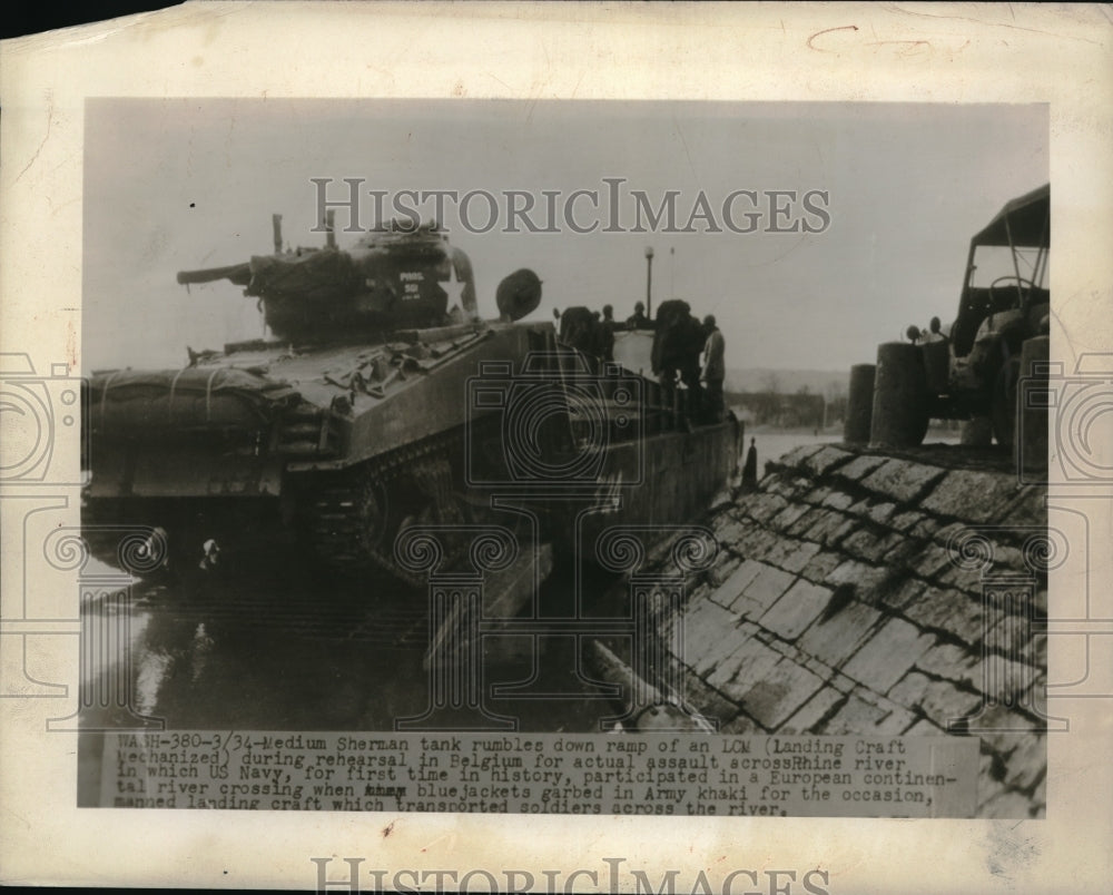 1945 Medium Sherman Tank ramp down during rehearsal in Belgium. - Historic Images