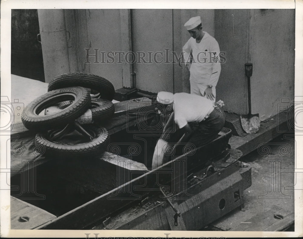 1941 US Sailors removing cargo from the German Vessel Odenwald - Historic Images