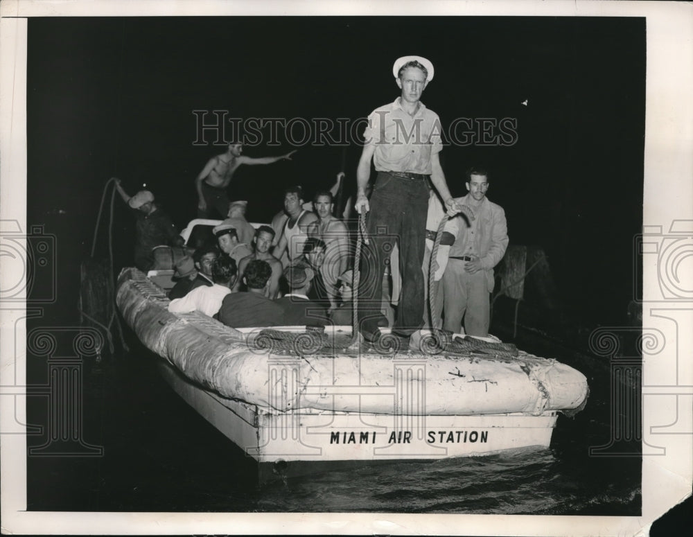 1948 Press Photo Coast Guard tie up survivors of the plane crashed on Bahamas. - Historic Images