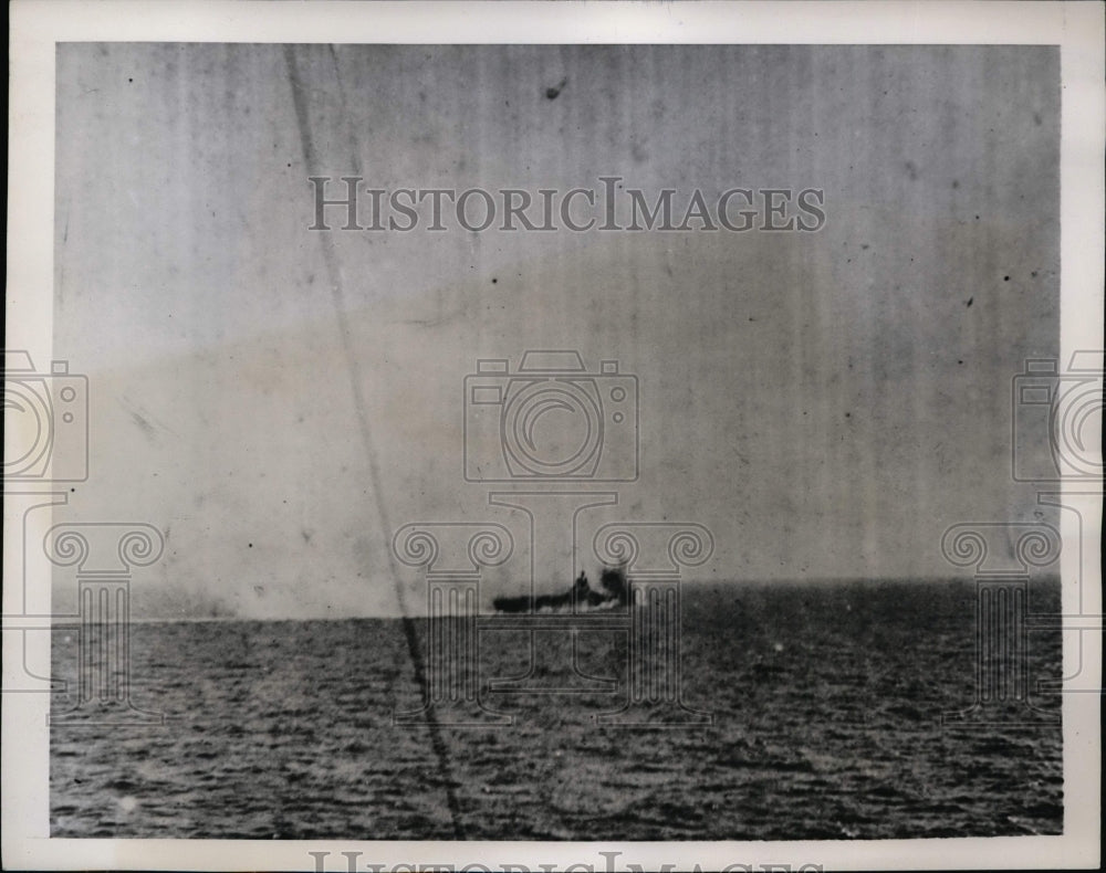 1941 A aircraft carrier under attack in the Mediterranean sea - Historic Images