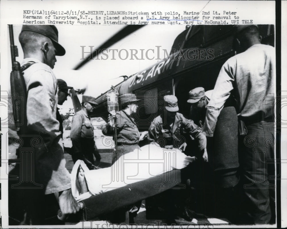 1958 Press Photo Marine 2nd Lt. Peter Hermann Placed Aboard US Army Helicopter-Historic Images