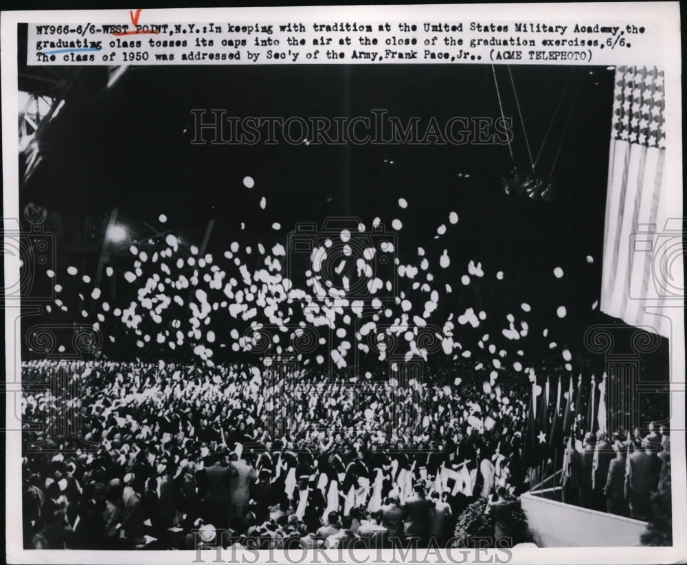 Press Photo Graduates of Military toss caps in the air during graduation - Historic Images