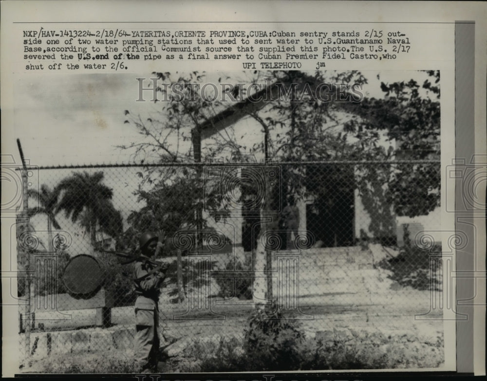 1964 Press Photo Cuban Sentry at Water Pumping Station for Guantanamo Base-Historic Images