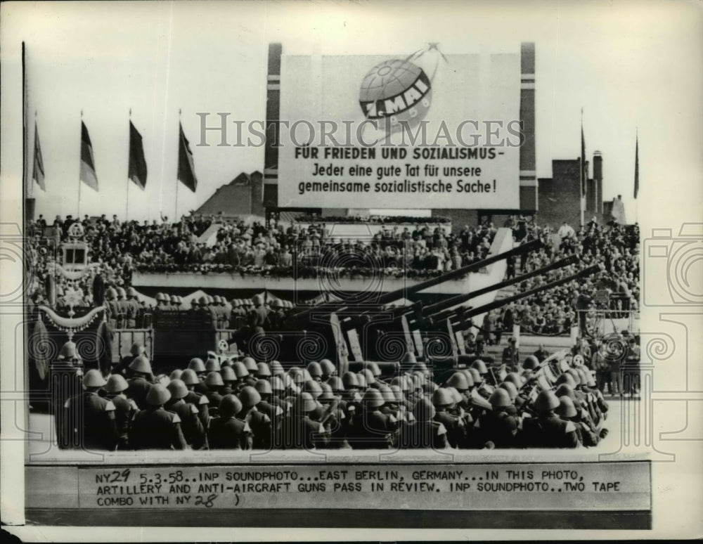 1958 Press Photo East Berlin Germany artillery guns pass in parade review-Historic Images