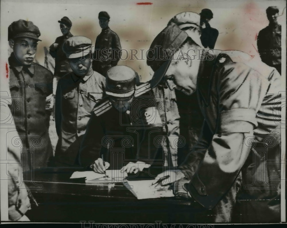 1953 Press Photo North Korean & UN Officers Sign for Prisoner Exchange-Historic Images